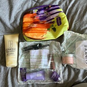 20 piece Clinique set -skincare, makeup and makeup bags